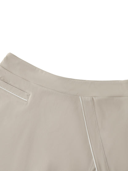 ARĒTÉ High-Waist Pocketed A-Line Skirt